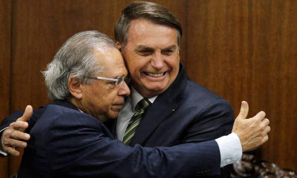x85542276_Brazils-President-Jair-Bolsonaro-greets-Brazils-Economy-Minister-Paulo-Guedes-during.jpg.pagespeed.ic.bzrpH8f1o5