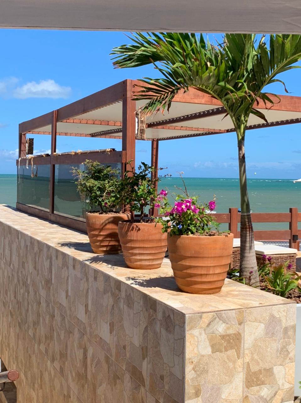 A bela vista do gazebo da beach house de Mário Barreto